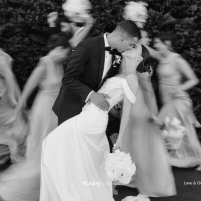 Bouquet toss alternatives with black and white bride and groom