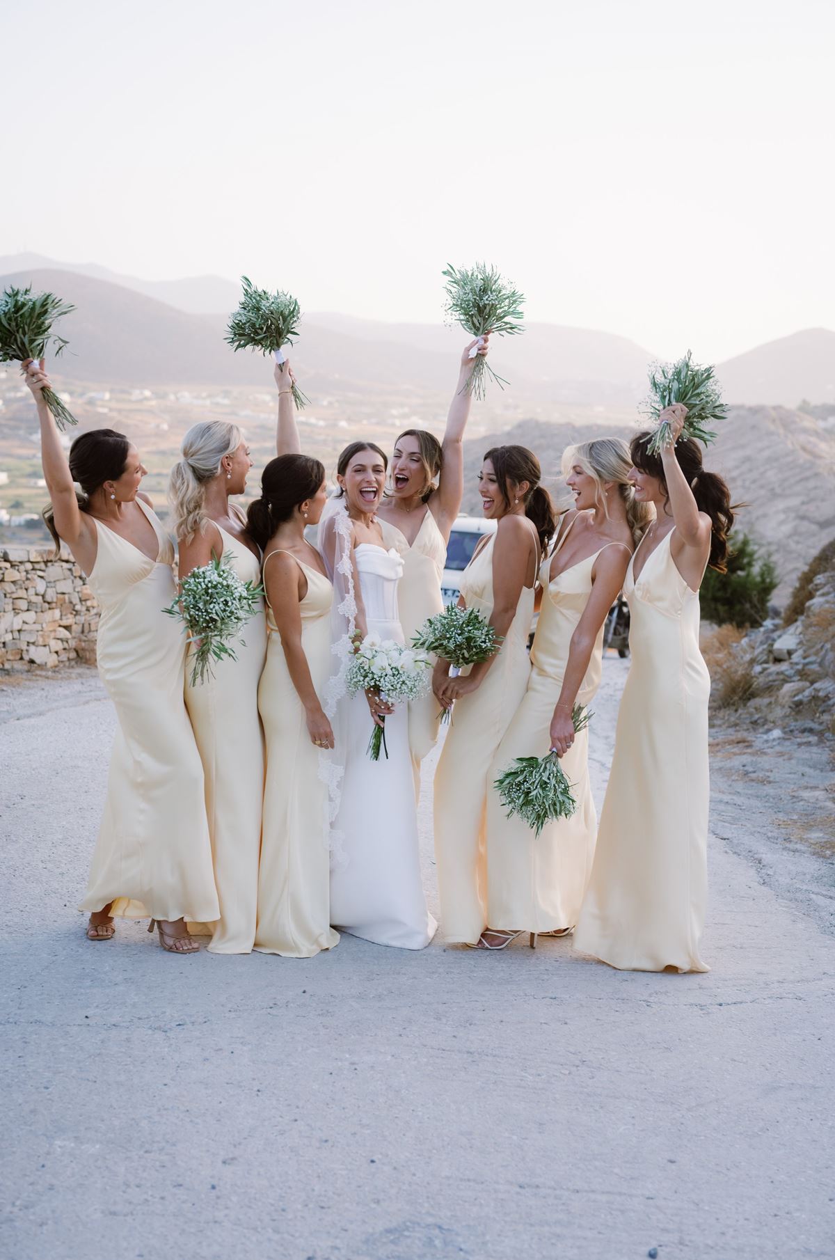 yellow wedding bridesmaids and white dress bride