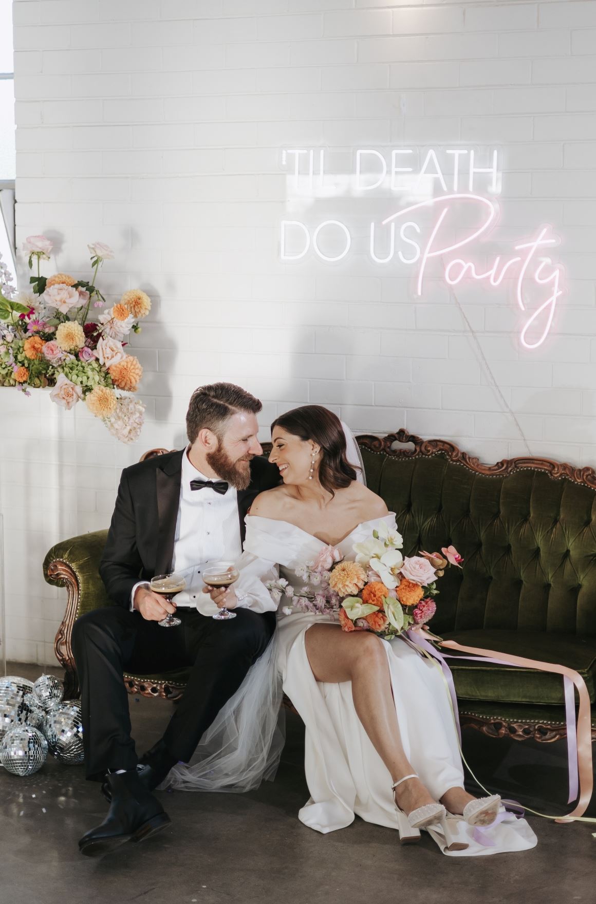couple drinks chamapge on their wedding day