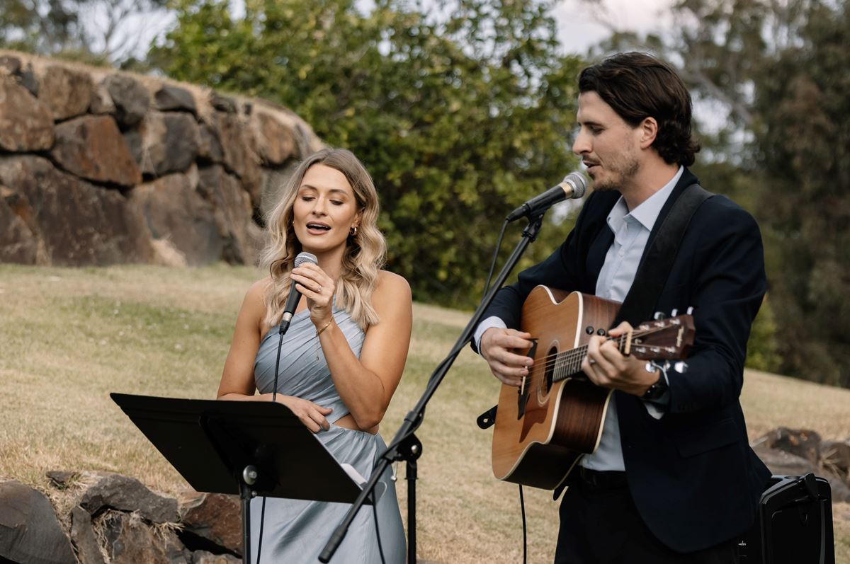 duo singing at wedding