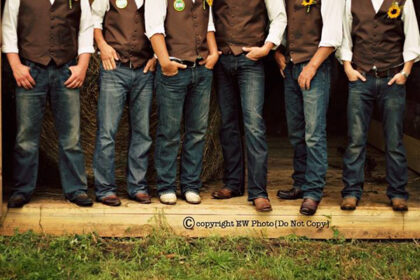 cowboy groomsmen wearing jeans at wedding