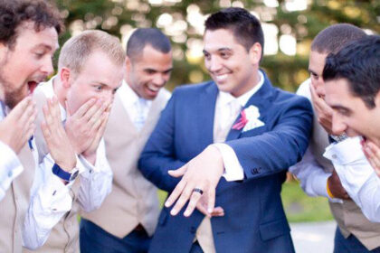 grooms and grromsmen having fun at the wedding