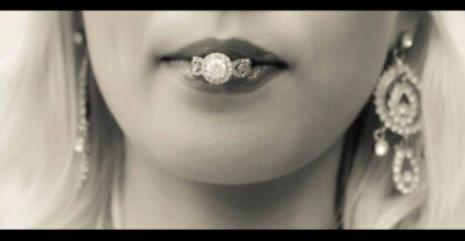 egagement ring in lips