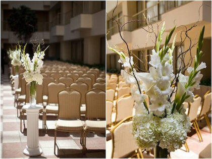 wedding aisle flowers on columns