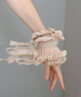 ruffled cuff on hand