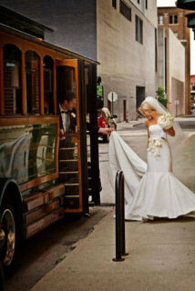 bride getting on a bus