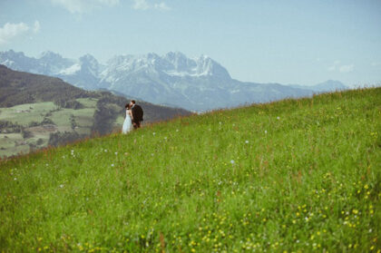 a wedding couple in green hills