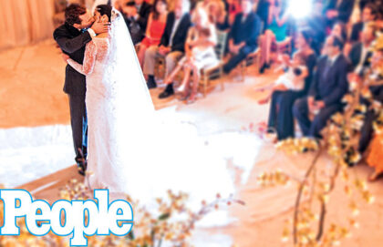 A gorgeous shot taken by People Magazine as the newlyweds kiss