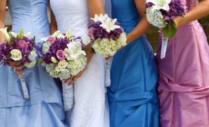 bridesmaids holding bouquets