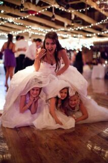 bride and flower girls peekaboo photo