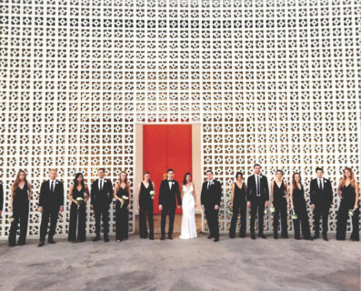 bridesmaids in black jumpsuits