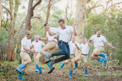 groomsmen in bright blue gumboots