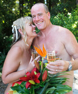 New Zeland naturists Nick and Wendy Lowe got married in their birthday suits|Nick and Wendy Lowe married in the buff in New Zealand last week|The happy couple sign the register after marrying at the Wellington Naturist Club|New Zealand couple's naked new year wedding|New Zealand naturists Nick and Wendy Lowe got married in their birthday suits|