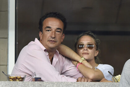 Mary-Kate and Ashley Olsen|Mary-Kate Olsen and Olivier Sarkozy with wedding rings. Image: INFphoto.com|