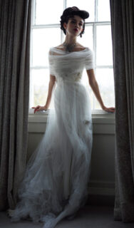 form-fitting gown with multiple layers|form-fitting gown with multiple layers