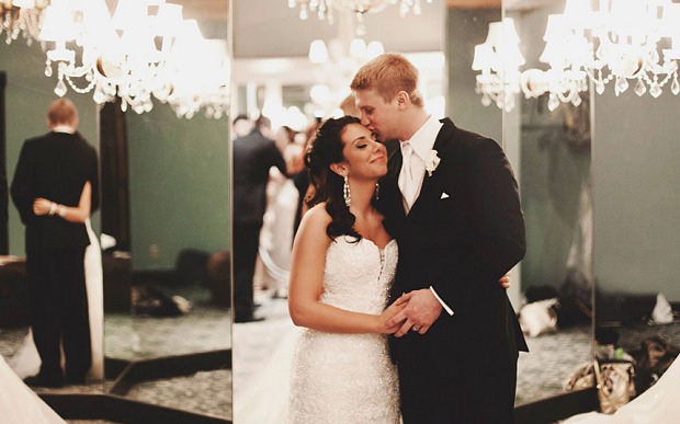 Couple wed 20 years after first walking down the aisle as children