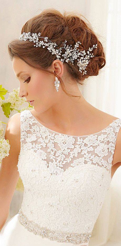 Delicate blooms and a train chapel, makes for an amazing dress!