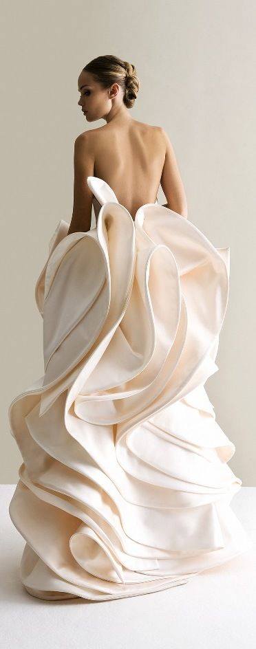 That is a beautiful gown, have a seat!