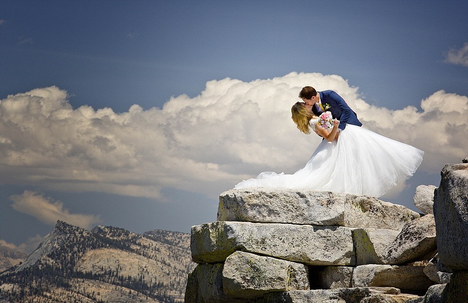 Terrified of heights, photographer endures 14-hour climb for stunning cliff-face wedding shoot