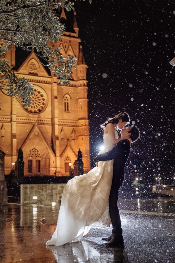 Water bomber swoops in to photobomb couple’s wedding shoot