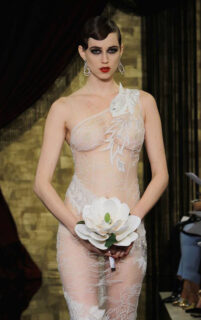 A long-sleeved wedding dress with a see-through tulle skirt by Inbal Dror. Image: Inbal Dror via Instagram|A long-sleeved ivory tulle and lace number by Pronovias. Image: Pronovias via Instagram|Zuhair Murad's 2016 collection features lots of lace and see-through tulle. Image: Zuhair Murad via Instagram|Theia-couture-see-through-gown This completely see-through wedding dress by Theia Couture was the finale look for their runway show during Bridal Fashion Week. Image: Theia Couture via Facebook|Alon Livne's star spangled wedding gown proves the thigh's the limit! Image: Marie Claire|Leaving little to the imagination: a sheer work of art by Inbal Dror. Image: Inbal Dror via Instagram|Raw edged lace mixed with sheer layers of tulle are certainly the highlights of this Netta BenShabu wedding dress. Image: Netta BenShabu via Facebook|A see-through ethereal dress with silver tones and foliage-inspired embroidery. Image: Inbal Dror via Facebook|This Galia Lahav dress certainly embodies the notion of 'party in the back'. Image: Galia Lahav via Facebook|A sexy off-the-shoulder Liz Martinez gown with a silk skirt and thigh-high splits. Image: Liz Martinez via Facebook|A barely there bodice meets an abundant froth of tulle. Image: Inbal Dror via Facebook|Revealing Inbal Dror wedding dress|Leaving little to the imagination: a sheer work of art by Inbal Dror. Image: Inbal Dror via Instagram|Alon Livne's star spangled wedding gown proves the thigh's the limit! Image: Marie Claire||