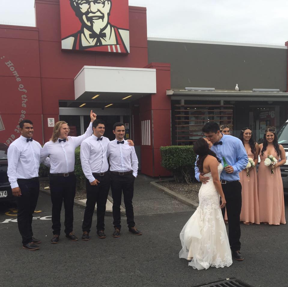 Finger-lickin’ photoshoot: would you take your wedding photos at KFC? This groom did!